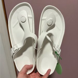 White foam flip flops